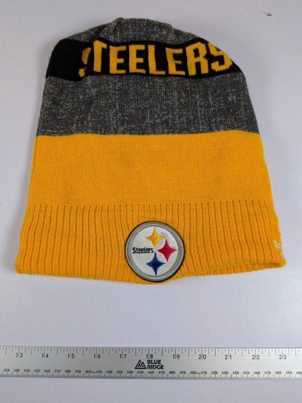 New Era Pittsburgh Steelers colorblock knit beanie Yellow Black And Grey